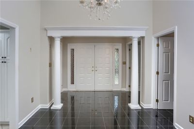 Amazing entry continues inside with leaded sidelites and columns | Image 3