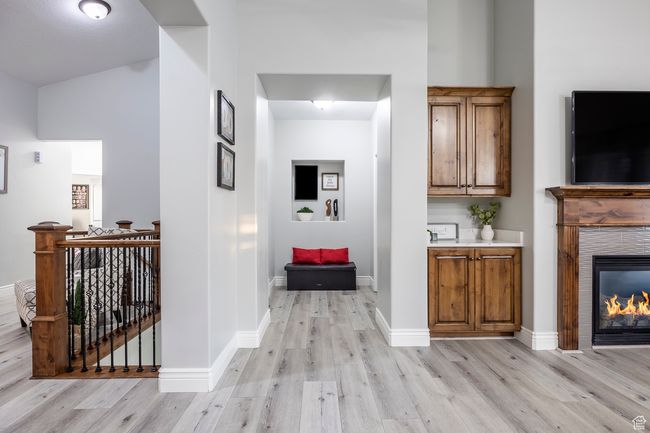 Hallway featuring light hardwood / wood-style flooring | Image 12