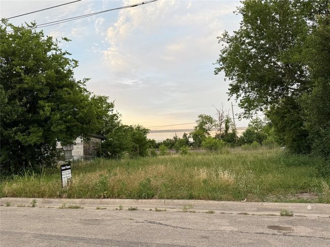 View of asphalt street with curbs | Image 12