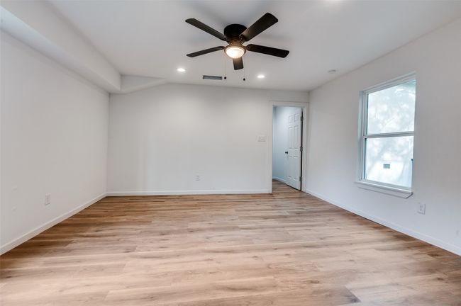 Unfurnished room featuring recessed lighting, visible vents, a ceiling fan, and baseboards | Image 8