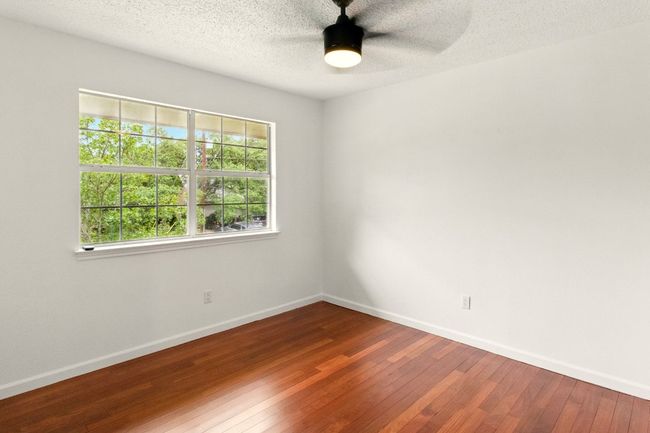 Well appointed 2nd bedroom and walk in closet. | Image 16