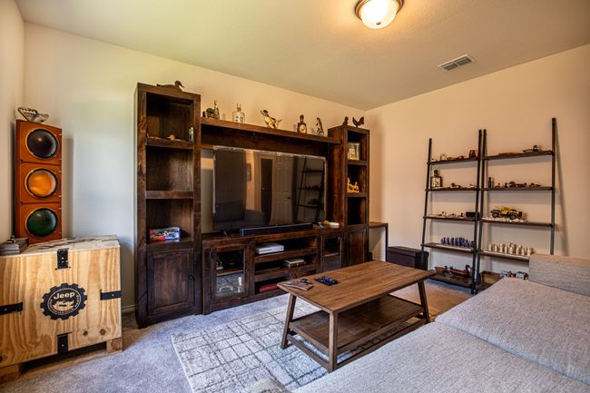 View of carpeted living area | Image 23