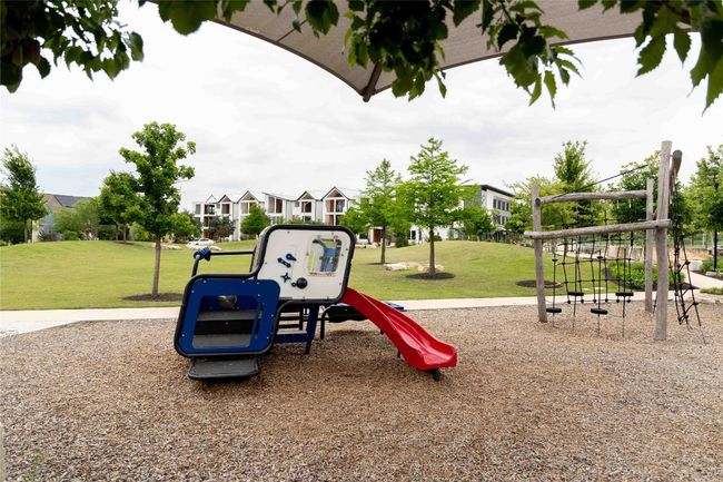 Community play area with a yard | Image 39