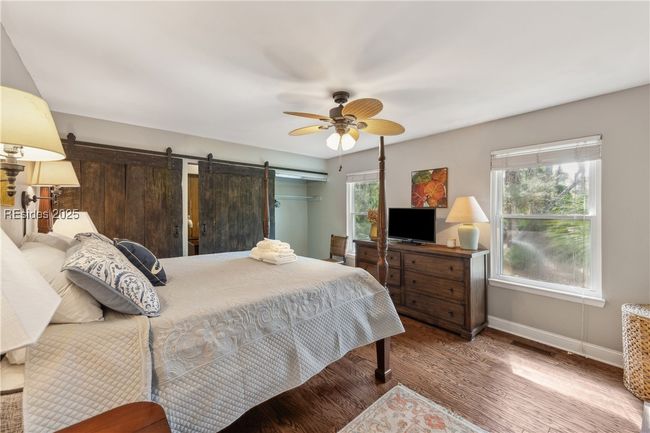 Large primary bedroom with spacious double closets, ample storage, and ensuite full bathroom. | Image 43