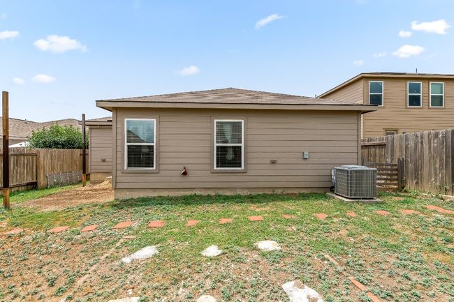 Back of house with central AC unit | Image 17
