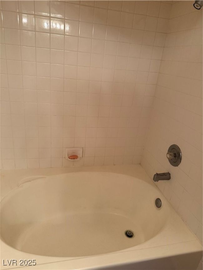 Full bathroom featuring shower / tub combination | Image 10