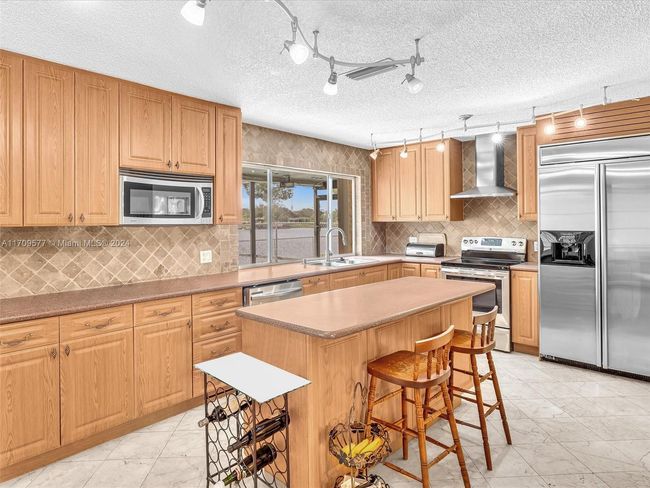 8910 Nw 7 Th Ct, House other with 3 bedrooms, 2 bathrooms and null parking in Pembroke Pines FL | Image 34