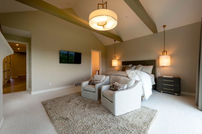 Bedroom with carpet floors, high vaulted ceiling, and recessed lighting | Image 28