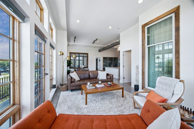 Living room with plenty of natural light and recessed lighting | Image 6