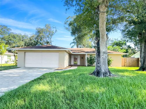 928 Parkwood Dr, DUNEDIN, FL, 34698-7233 | Card Image