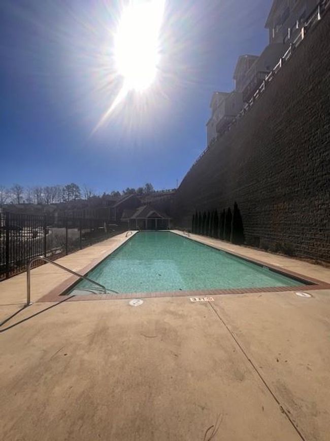 1935 Manor Pointe Dr, Condo with 3 bedrooms, 3 bathrooms and null parking in Cumming GA | Image 59