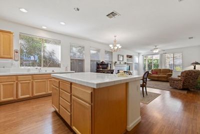 Kitchen over looking living and dining room. | Image 2