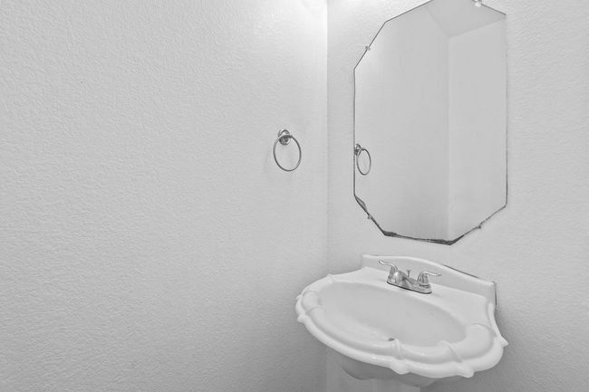 Bathroom featuring a sink | Image 27