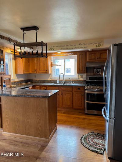 Kitchen with granite countertops | Image 3