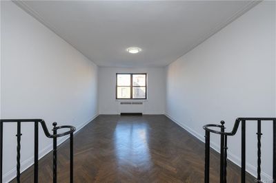 APT. 65 - Sunken Living Room looking north from Dining Foyer. | Image 3