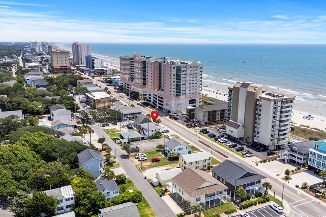 View of urban area featuring a nearby body of water | Image 38