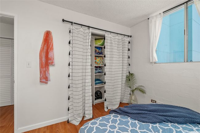 Large closet with built-in shelves extra hooks | Image 16