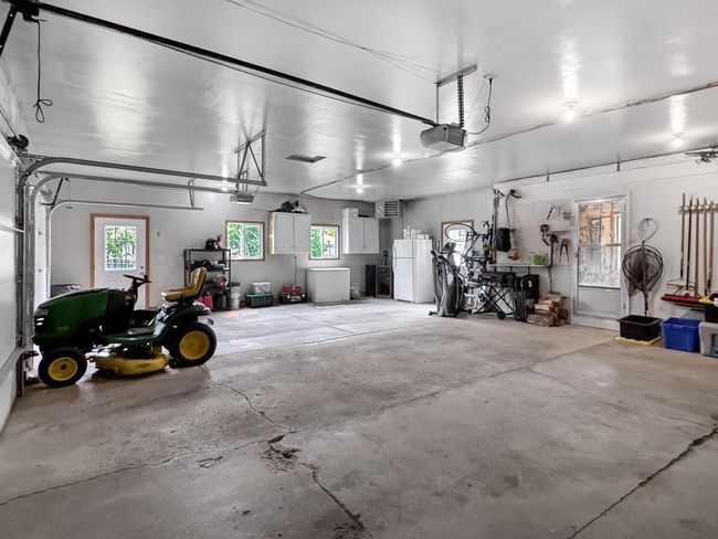 Attached 3 stall garage | Image 34