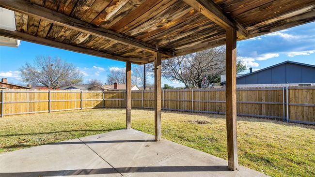 View of yard featuring a patio and a fenced backyard | Image 27