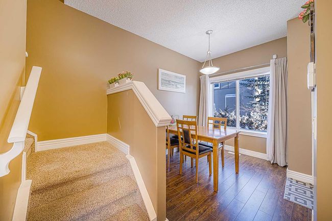 84 Bridleridge Manor Sw, Home with 3 bedrooms, 2 bathrooms and 1 parking in Calgary AB | Image 8
