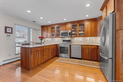 unit-113-100 Baker Ct, Island Park, NY, 11558-2272 | Card Image