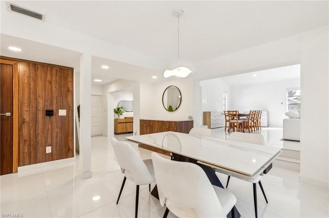 Dining area with recessed lighting, visible vents, and light tile floors | Image 16