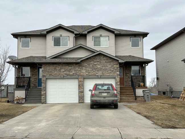 11224 71 Avenue, Home with 3 bedrooms, 1 bathrooms and 2 parking in Grande Prairie AB | Image 3