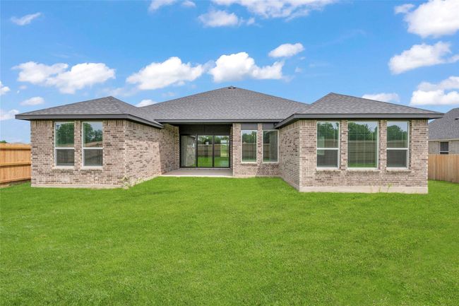Please Note: These exterior photos are not of the actual design, but are of a completed design with a similar floor plan. Finishes, features, and layouts may vary. | Image 20