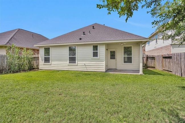 The backyard offers a fresh canvas, ready for you to design your ideal outdoor retreat—whether it's a lush garden, play area, or relaxing entertainment space. | Image 25