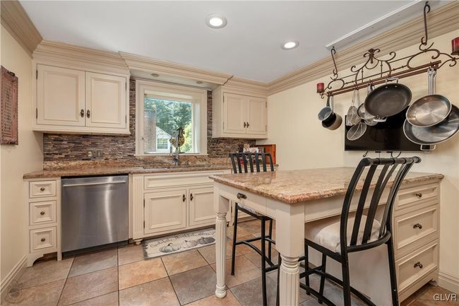 Granite countertops; custom cabinets | Image 9