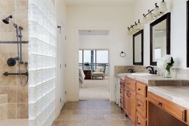 Full bath featuring walk in shower, vanity, and tile patterned floors | Image 30