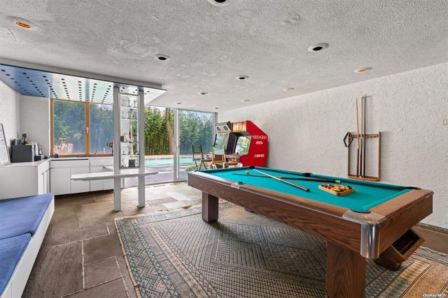 Pool room exits to pool | Image 19