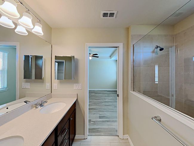 7603 Pool Compass Loop, House other with 4 bedrooms, 3 bathrooms and null parking in Wesley Chapel FL | Image 14