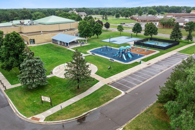 The community center is a 13 min walk and features another playground, pickleball courts, and a splash pad. | Image 28