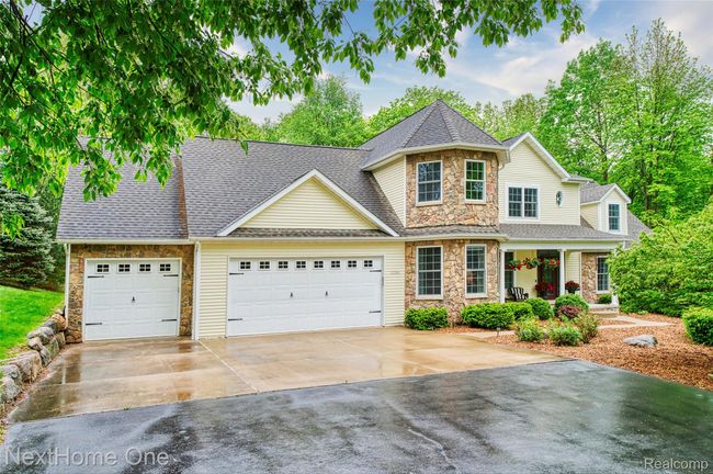 Front view with attached 3 car garage | Image 28