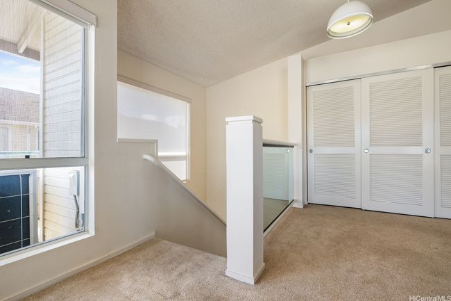 Private entryway -staircase leads from the 1st floor entry/garage to the 2nd floor living area. | Image 7