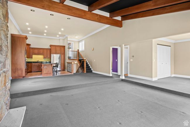 Garage featuring freestanding refrigerator and recessed lighting | Image 19