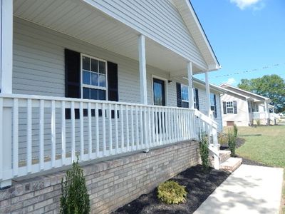 Covered front porch and newer landscaping | Image 2