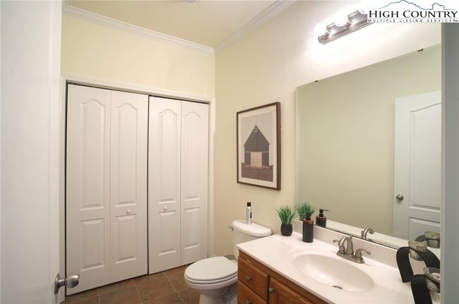 Downstairs bath & laundry room. Full size washer & dryer | Image 15