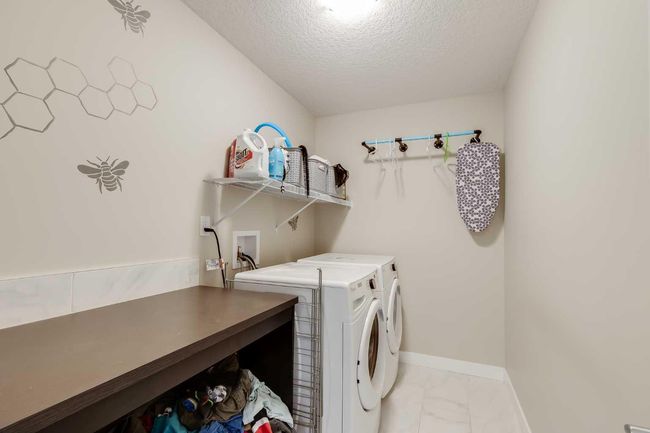 1746 Baywater View Sw, House other with 3 bedrooms, 3 bathrooms and 4 parking in Airdrie AB | Image 23