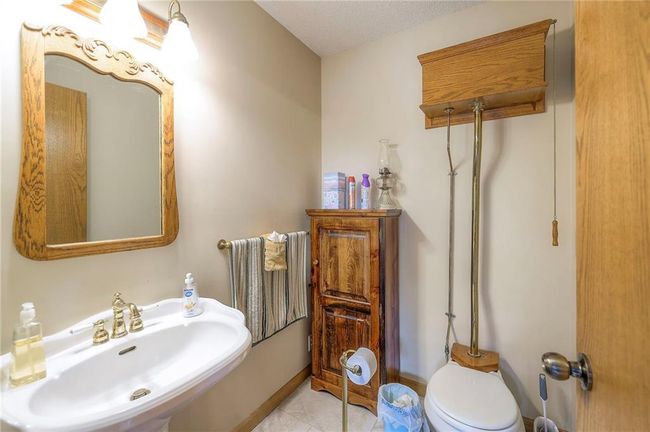 Bathroom featuring a sink and tile patterned flooring | Image 21