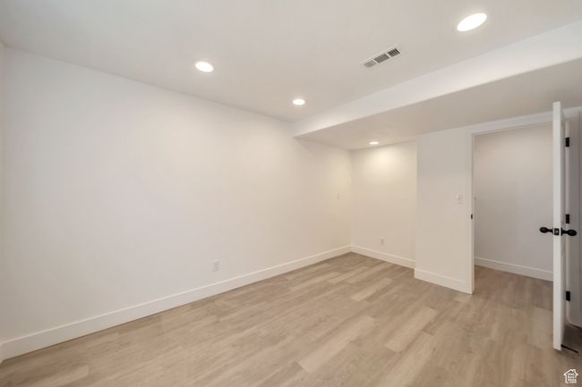 Finished bedroom, featuring LVP floors, and recessed lighting | Image 26