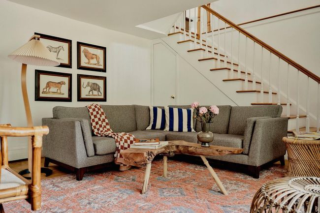 Living room featuring stairway and light wood finished floors | Image 10