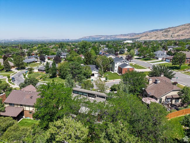 Aerial perspective of suburban area featuring a mountainous background | Image 76