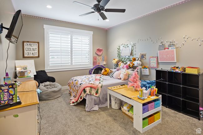 Bedroom with carpet flooring, recessed lighting, ceiling fan, and crown molding | Image 46