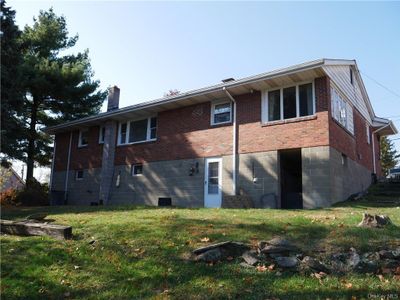 Back of house featuring a lawn | Image 3