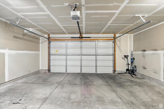 Garage with a garage door opener | Image 20