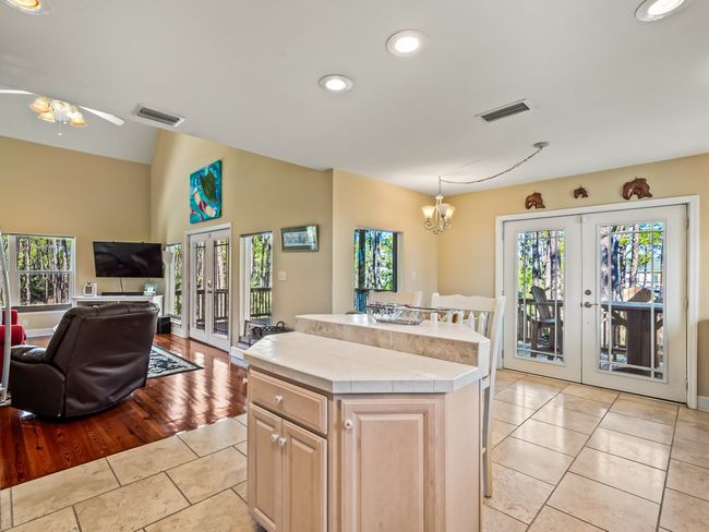 27 Harry Morrison Island Dr, House other with 3 bedrooms, 2 bathrooms and 3 parking in Alligator Point FL | Image 16