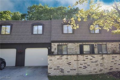 View of front of property featuring a garage | Image 1