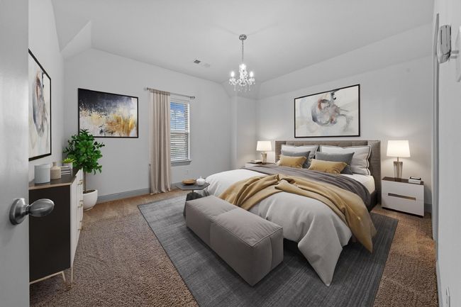 Carpeted bedroom with an inviting chandelier, lofted ceiling, visible vents, and baseboards | Image 20